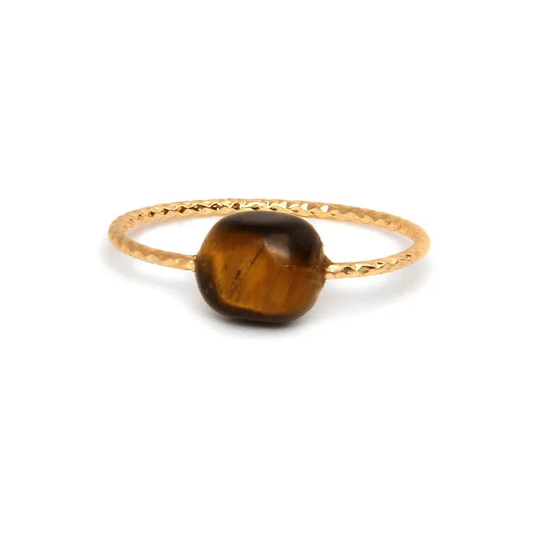 A women's ring featuring a geometric design set with a coloured agate stone.