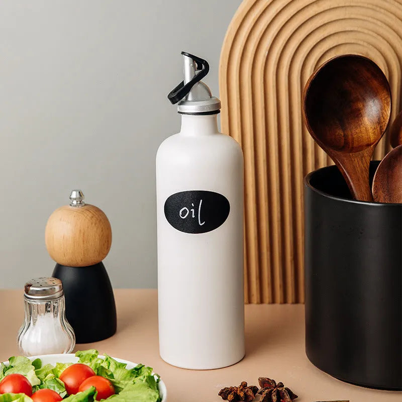 Ceramic kitchen oil pot with funnel and oil brush in black, coffee, or white.