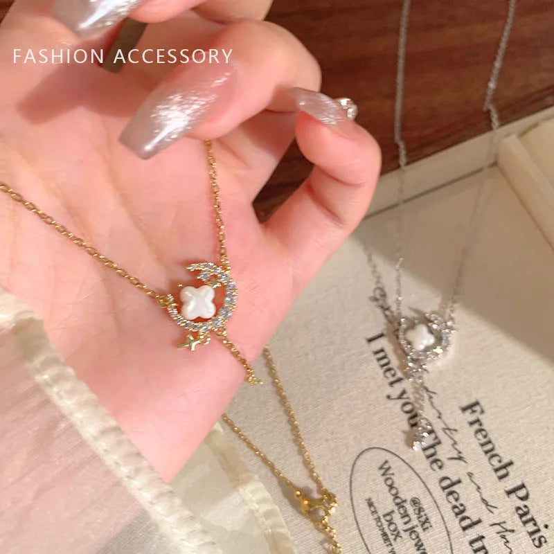 Women's star moon necklace with zirconium stones on adjustable copper chain in gold finish