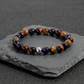 Handmade natural tiger-eye stone bracelet with geometric beads on elastic cord
