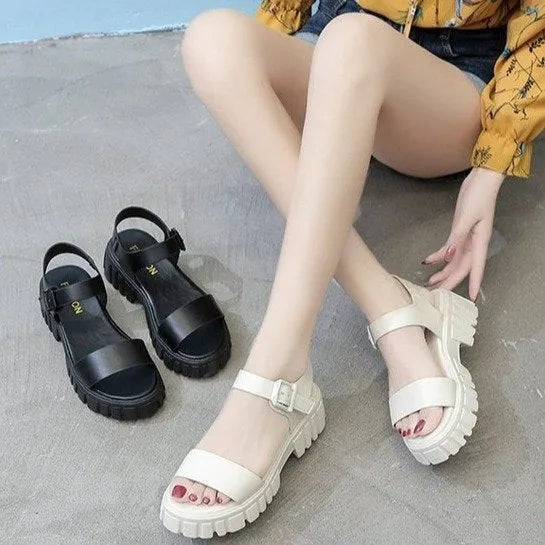 Women's beige peep toe platform sandals with an ankle-strap buckle on a white background