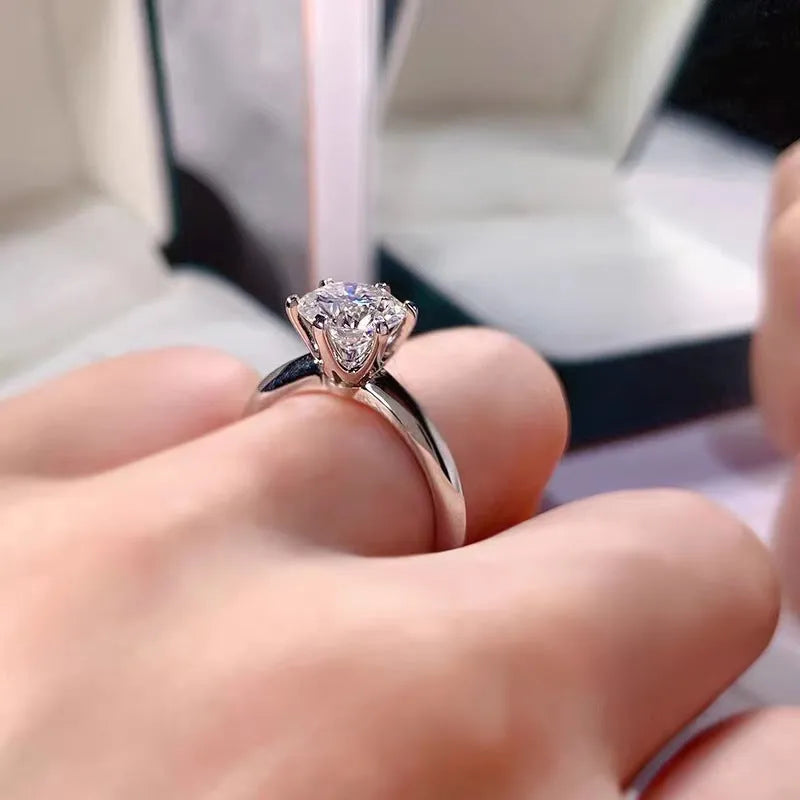 Women's six-claw inlaid zircon ring in white gold plated finish on geometric band