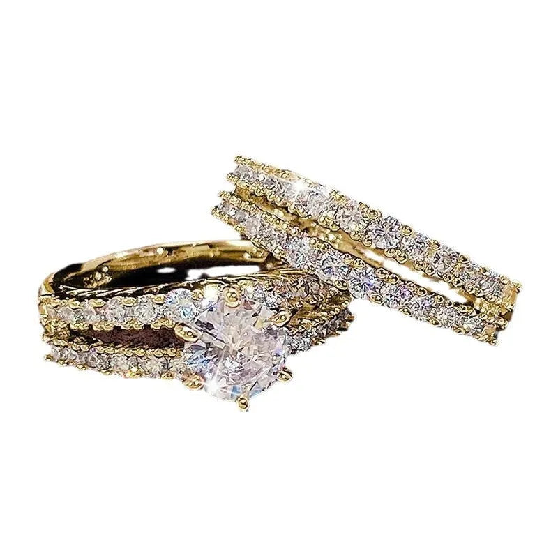 2-in-1 fully-jewelled female ring set in geometric design with round elements, shown in silver, gold and rose gold finishes