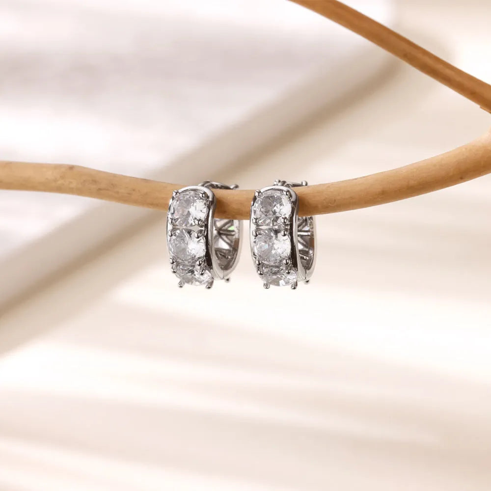 Silver U-shaped clip-on earrings for women with inlaid zircon stones, colour E5772P.