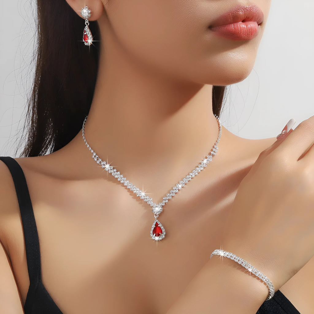 Claw chain necklace and earrings set with rhinestone drop elements in multiple colour options