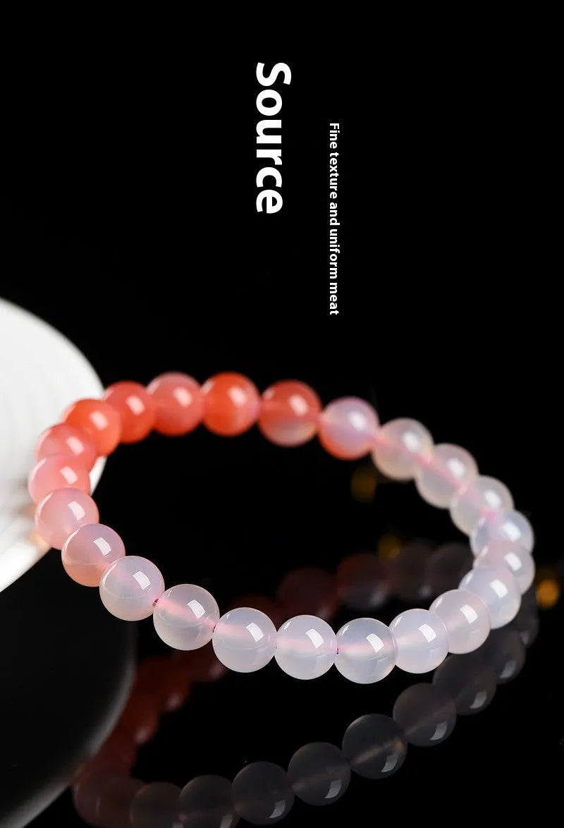 Natural gradient Yanyuan agate bracelet showing geometric beads in a salt source colour tone.