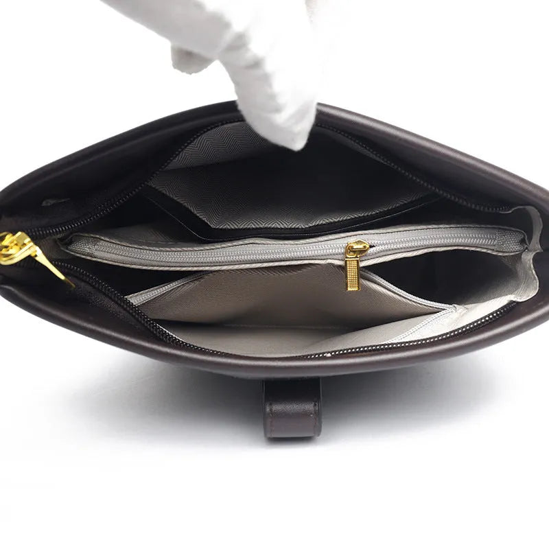 Korean style black bucket shoulder bag with adjustable straps and organised interior compartments