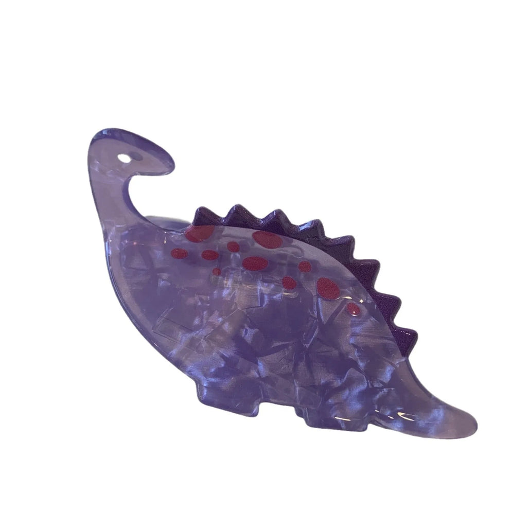 Acrylic dinosaur jaw hair clip showing six colour variations with grip-style fastening mechanism