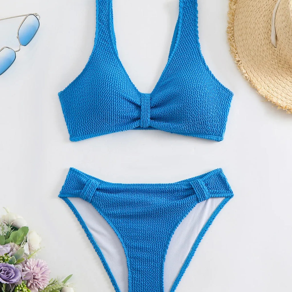 Women's solid colour two-piece bikini swimsuit with polyester fabric, bra and shorts, sizes S to XL