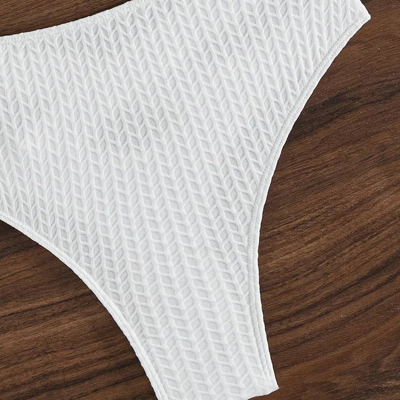 White backless bikini swimsuit set on a mannequin, showing front and back views.