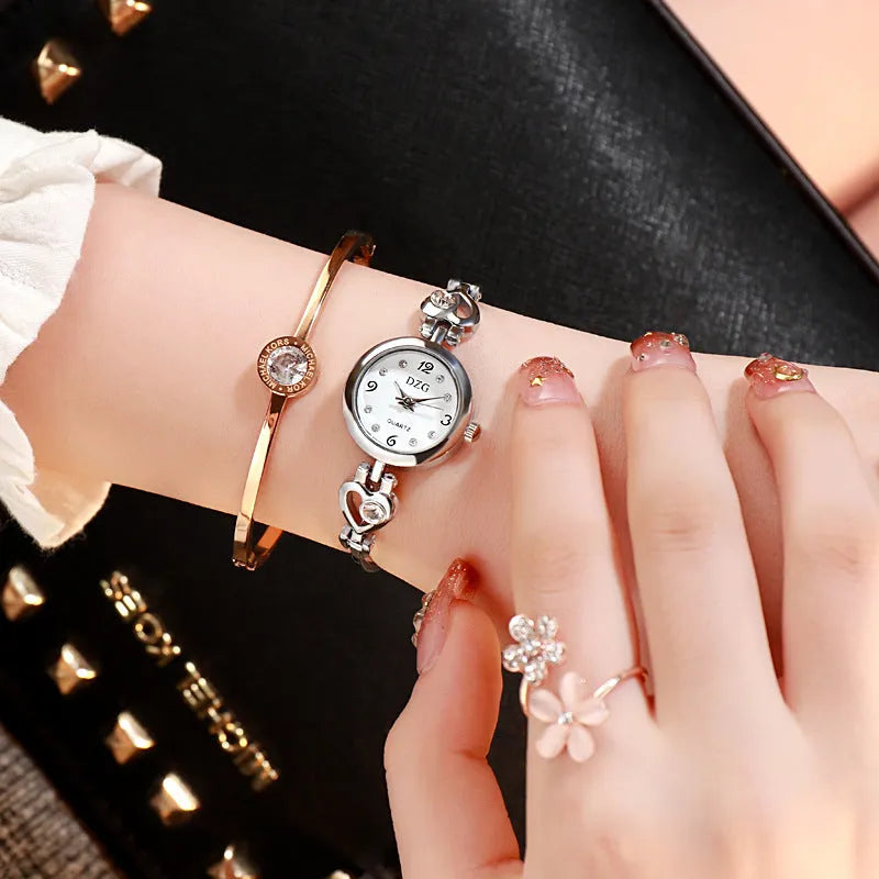 Women's simple rhinestone casual square watch with gold alloy strap and stainless steel buckle on white background