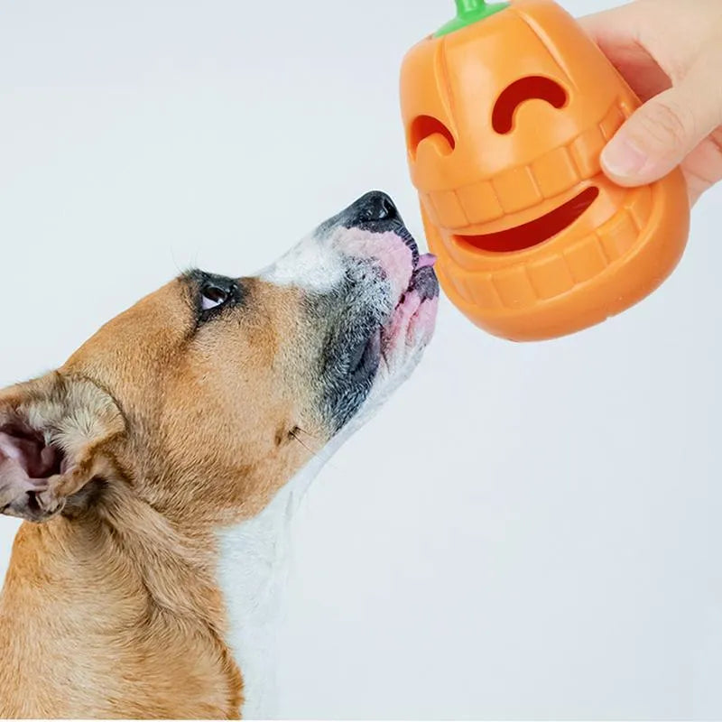 Yellow pumpkin-shaped TPR dog chew toy for aggressive chewers.