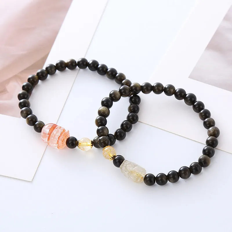 Natural obsidian Pi Xiu bracelet with gold obsidian stone and red flower design