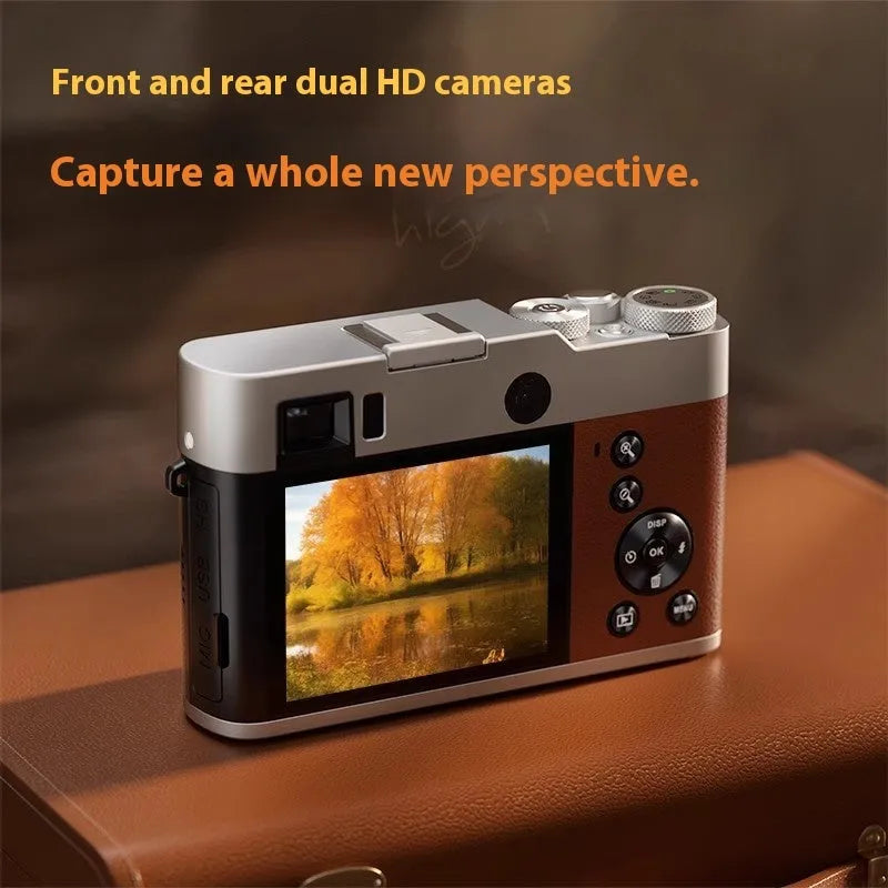 Black 5K digital camera with dual lenses and a 2.88-inch screen, shown with optical viewfinder.