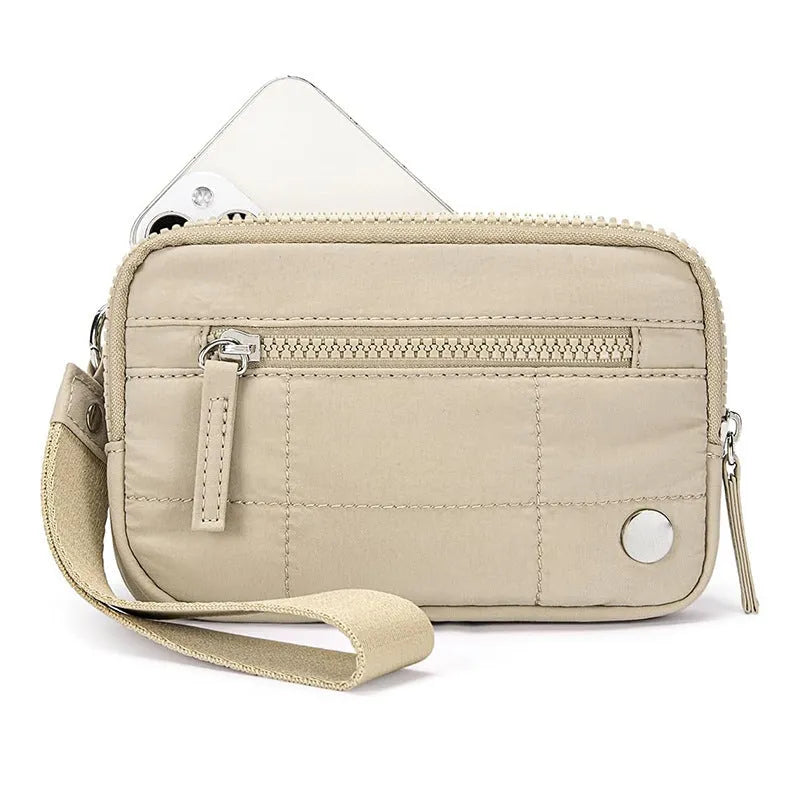 Waterproof quilted women's crossbody handbag with transparent deck panel in nylon material