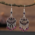 Retro long drop earrings with purple crystal fringes on an alloy setting.