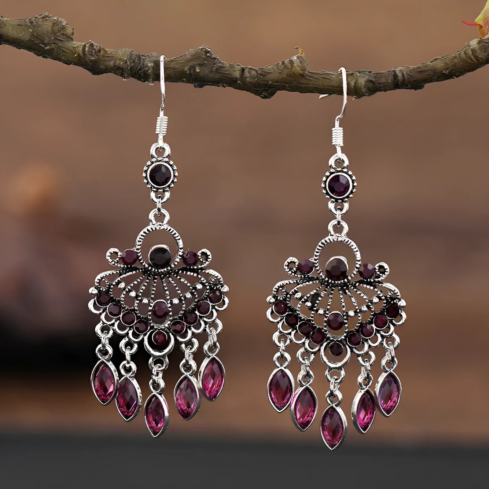 Retro long drop earrings with purple crystal fringes on an alloy setting.