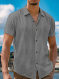 Men's linen lapel short sleeve shirt in eight colours including white, grey, orange, army green, navy blue, light blue, black, and khaki.