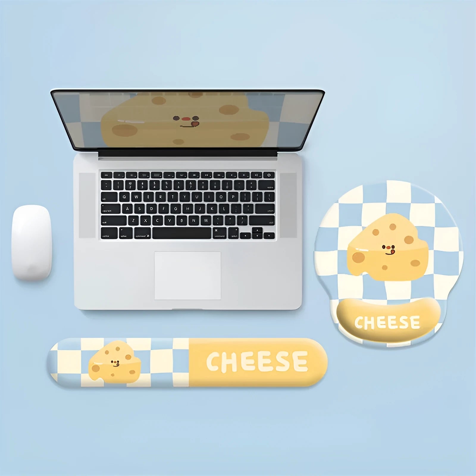 Cartoon cheese wrist rest mouse pad with keyboard holder placed on a wooden desk next to a notebook computer