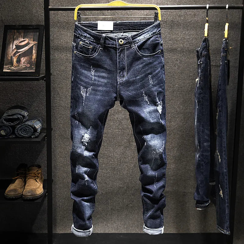 Men's slim-fit skinny jeans in dark blue and light blue cotton denim with stretch.