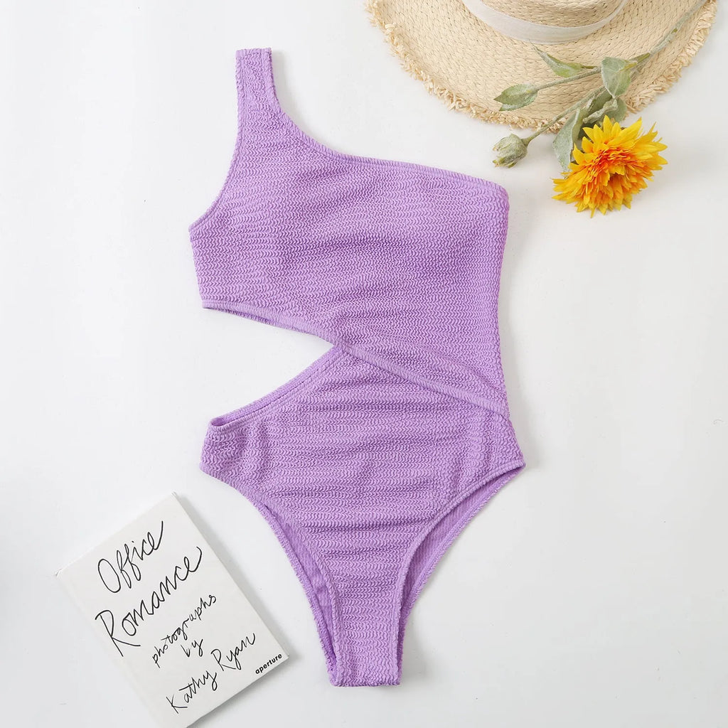 Solid colour women's one piece one shoulder swimsuit in polyester, available in multiple colours