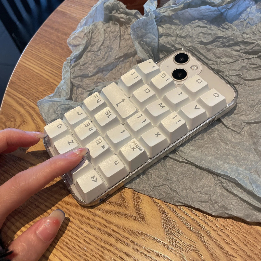 Creative keyboard mobile phone case with dripping glue material in keyboard colour, back cover type for Apple iPhone models.