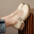 Flat Fairy Style cheongsam leather shoes with skull pattern print and a wedge heel.