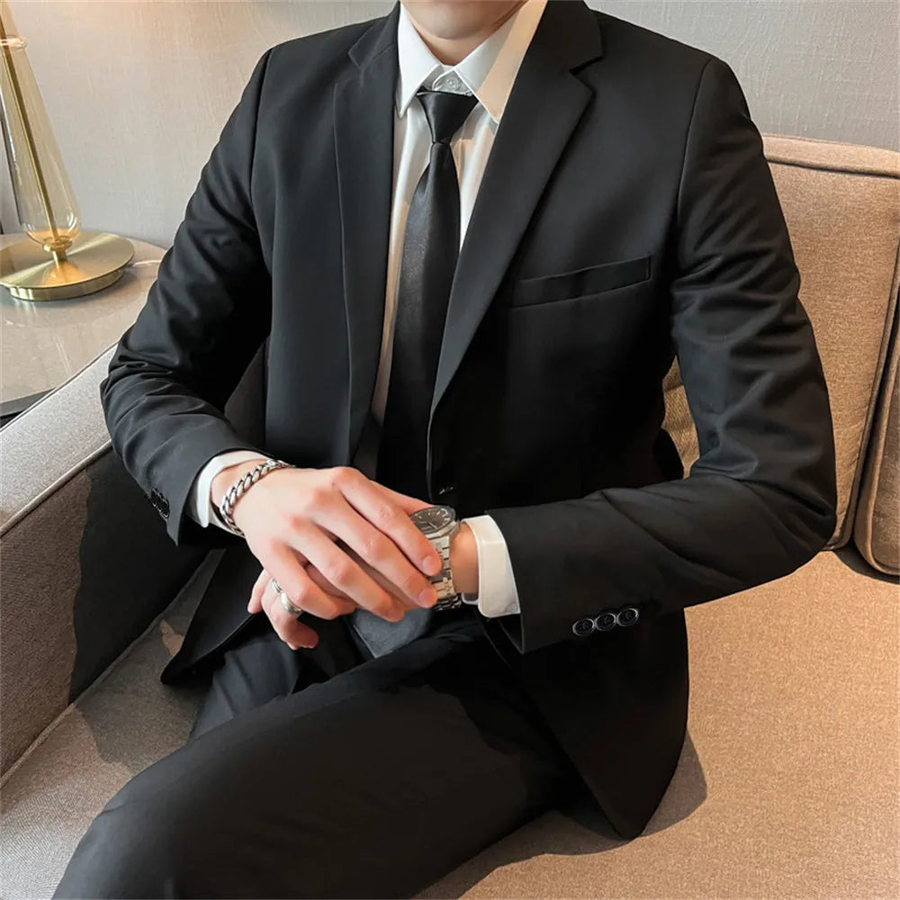 Men's slim fit corduroy suit set including jacket, trousers, shirt, and tie in a spring business casual style