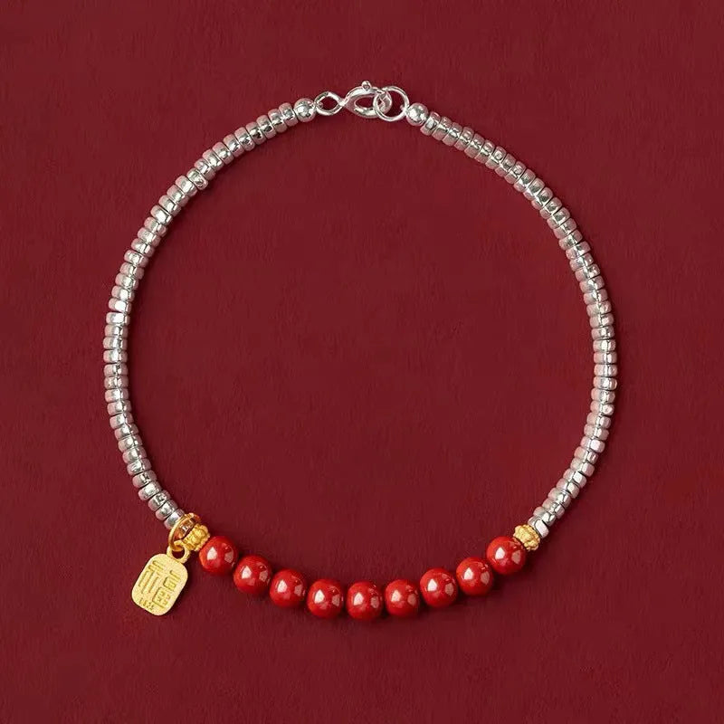 Silver geometric couple bracelet with round beads showing white K electroplated finish on 16cm length