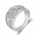 Men's large square diamond ring in copper with an adjustable band on a hand.