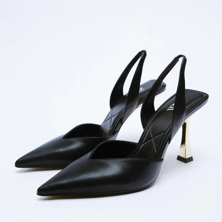 Women's nude and black patent leather pointed high heels with a shallow mouth design