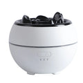 Round white ultrasonic flame aroma diffuser with water tank on desk