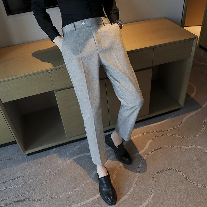 Men's straight cut brown corduroy trousers with elastic waistband shown front and side view