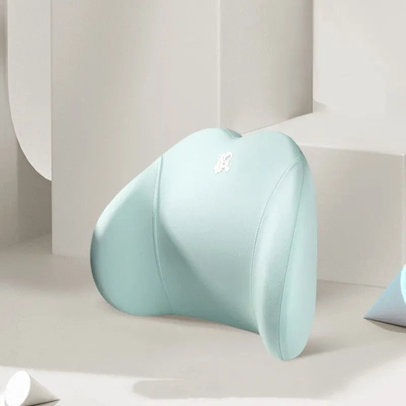 Heart-shaped car pillow in choice of colours, shown as headrest and lumbar support on a car seat.