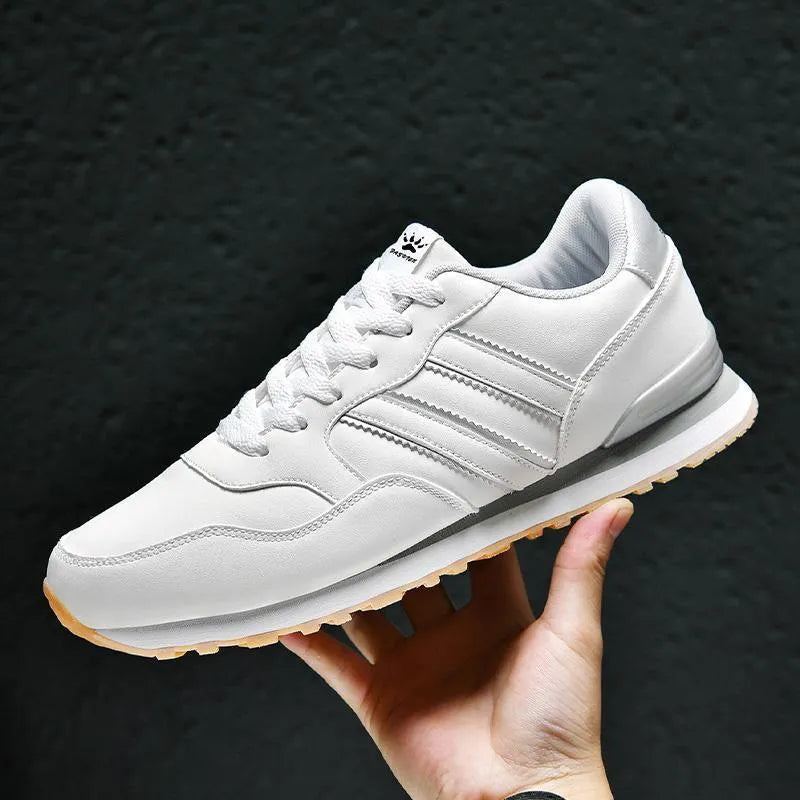 Men's black casual running shoes with white carved wing pattern on the side and a high heel.