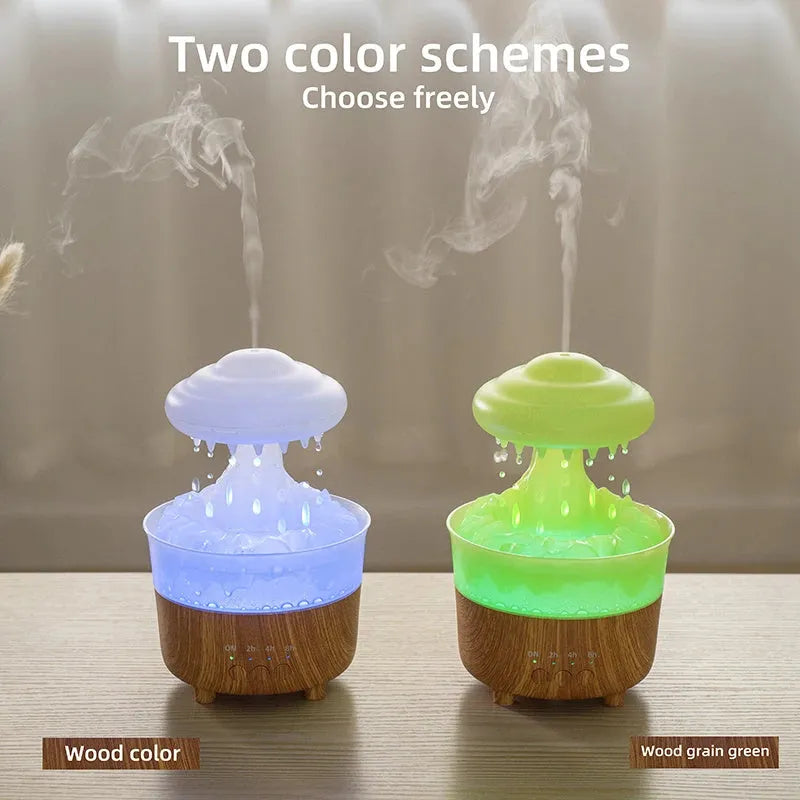 Wood grain white column-shaped rain cloud humidifier diffuser with LED night light on a table.