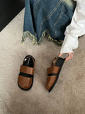 Korean style women's retro sandals with a black microfiber upper and adjustable ankle buckle on a PVC sole.