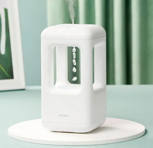 Weibel anti-gravity water drop humidifier white 500ml cool mist with atmosphere light on a nightstand