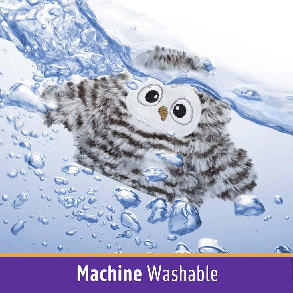 Grey automatic chirping owl cat toy with flapping wings on a flat surface.