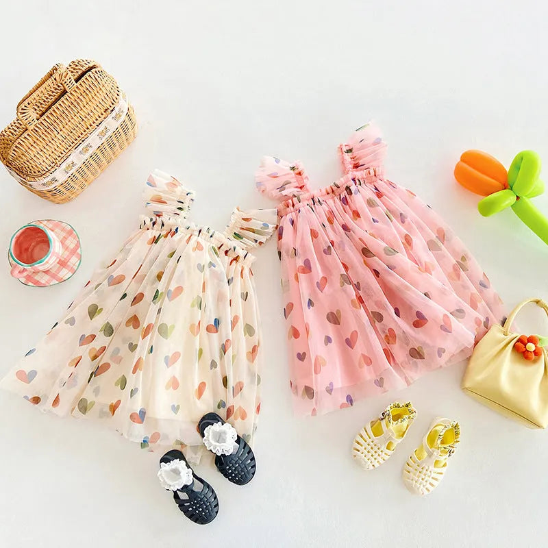 Summer cute heart printing mesh girl dress with cotton lining, apricot love colour, front view on child