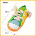 Squeaking plastic dog slipper chew toy in yellow, black, or blue colour.