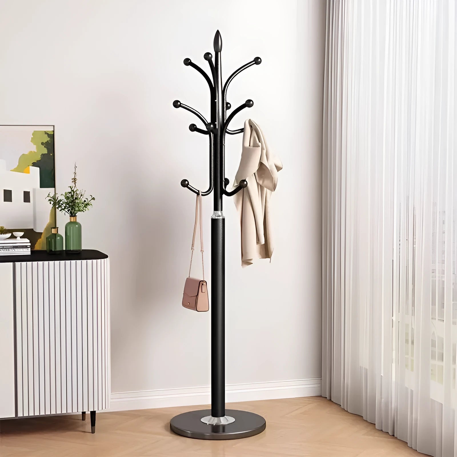 Floor-standing iron coat rack in black, vertical hanger for bedroom or hallway