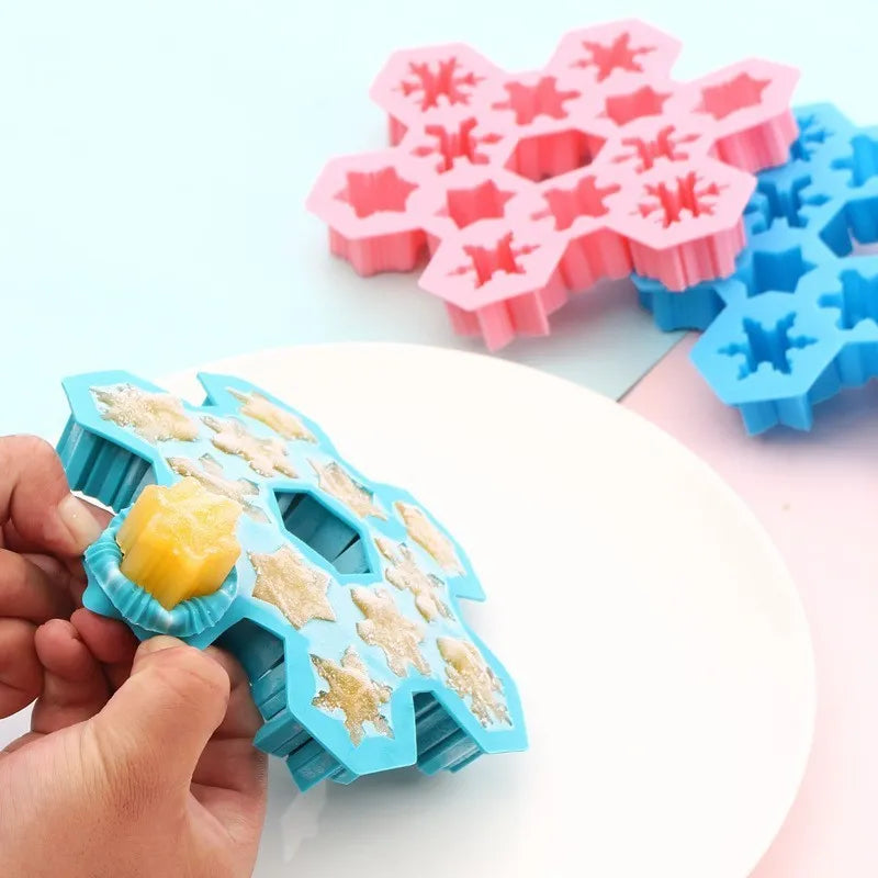 12-hole snowflake silicone mold in light blue for DIY ice cubes and baking