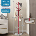 Floor-standing iron coat rack in black, vertical hanger for bedroom or hallway