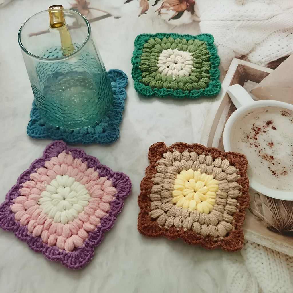 Crocheted grandmother lattice wool cup placemat coaster in emerald, sea salt blue, dream purple or fog brown.
