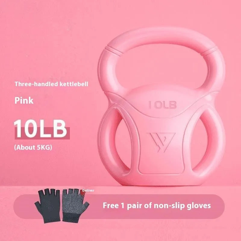 Pink kettlebell 10 lbs with gloves on wooden floor for home exercise