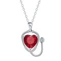 Red diamond women's necklace with stethoscope, wing, and cross pendant design on a copper chain.