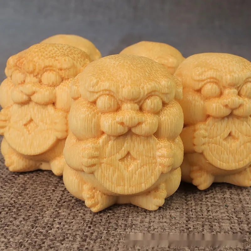 Solid bamboo carving ornament with traditional take money design measuring 4.5cm height
