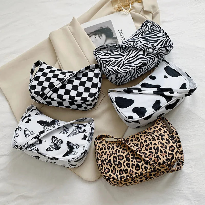Women's small nylon underarm bag with leopard print pattern and zipper closure, 23cm size