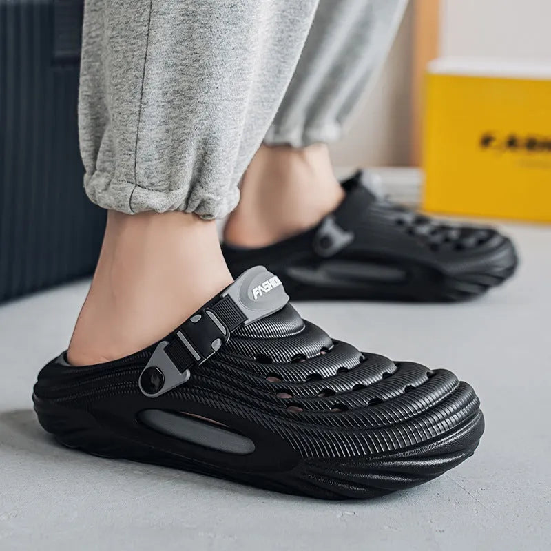 Men's solid colour EVA platform slippers with hollow-out design in light green.